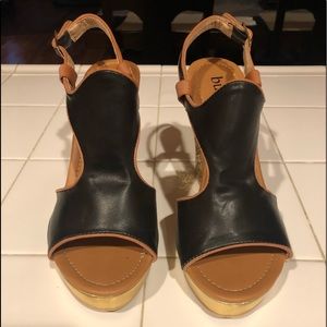 Black summer heels with glitter gold detail.